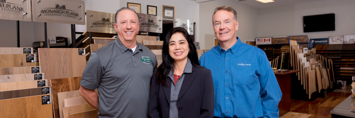 Butch Kirk, San Jose Hardwood Floors, Carpet & Vinyl with two bankers.